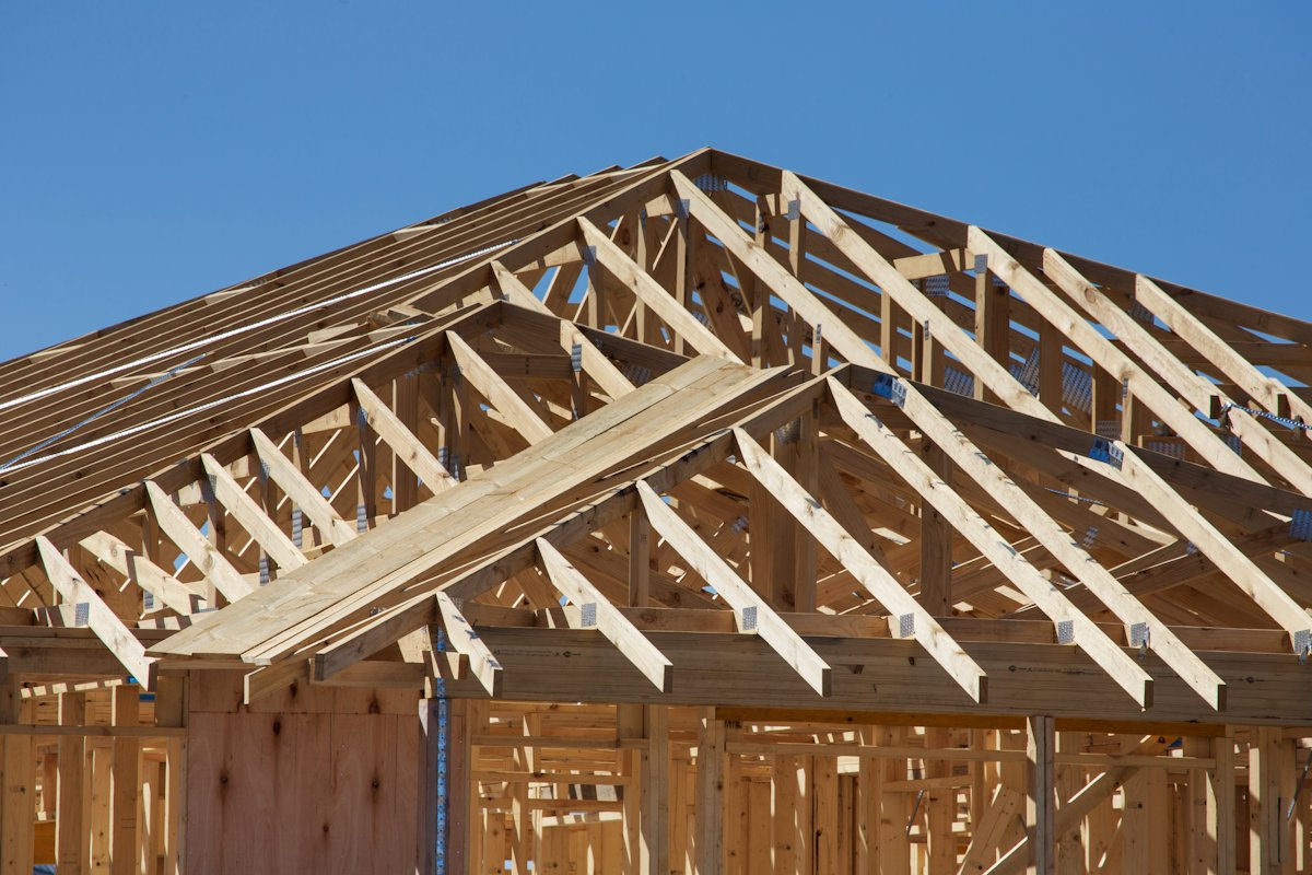 Roof trusses going up on a new ARMAD home